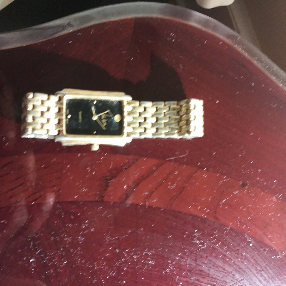 Gold plated John weitz watch